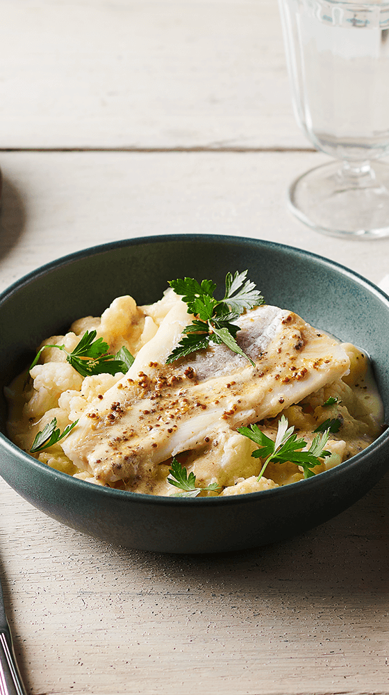 Photographie d'une assiette de Cabillaud sauce moutarde et sa puree de choux-fleurs Findus